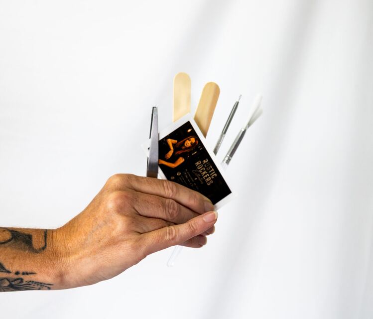 The Rustic Rockers Esthetics card with wax sticks and tweezers